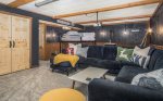 Beautiful bonus room with large sectional and plenty of seating for everyone
